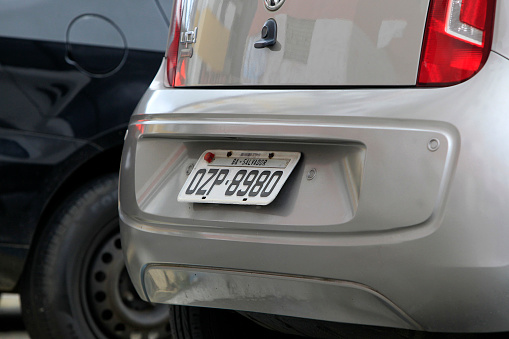 salvador, bahia, brazil - may 26, 2022: vehicle identification plate used in automobiles from Brazil seen on a parked car in Salvador city.
