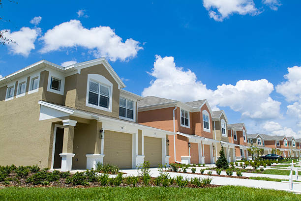 Colorful apartment condos with bright blue sky