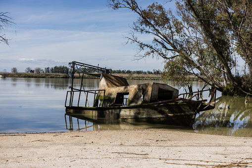 Boats in Guadalquivir river, Donana National Park of Spain