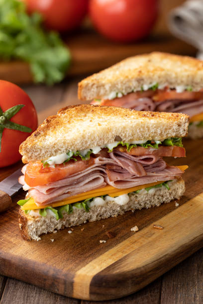 istock Ham sandwich with cheese, lettuce and tomato 1399889978