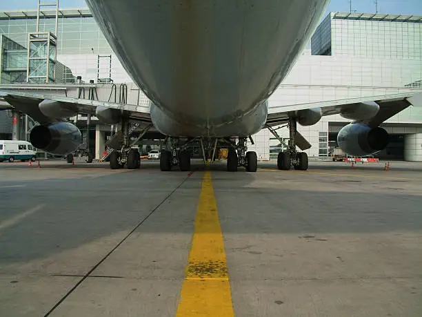 The impressive bottom of an Boeing 747-400 in parking position