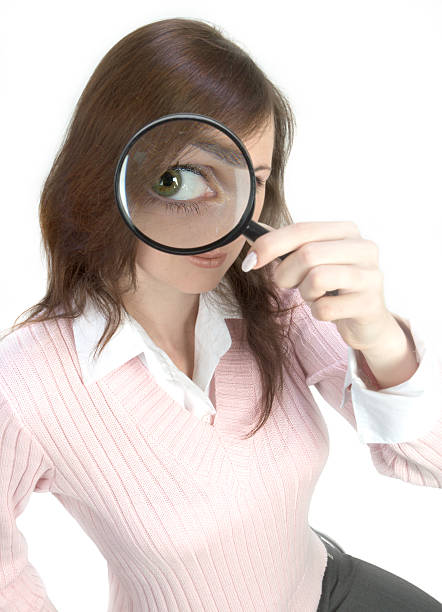 若い女性、拡大鏡 - low scale magnification glass women holding ストックフォトと画像