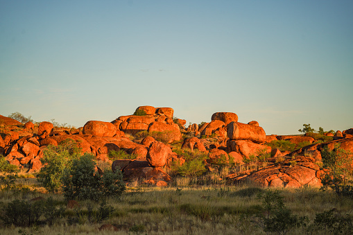 Sun setting over the rocks at the devils marbles in the Northern Territory