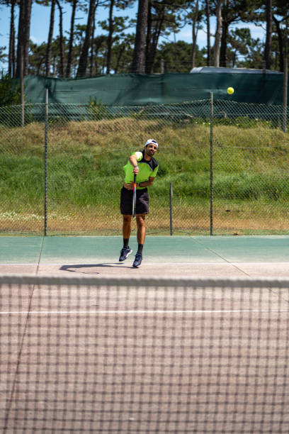 istock Tennis player performing a service 1399893822