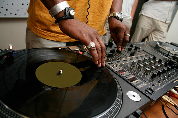 Free Stock Photo of DJ performing live with turntables and equipment on ...