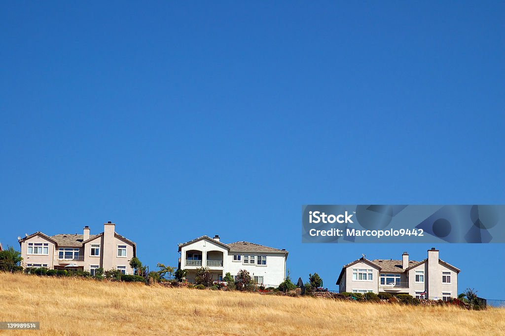 houses on a hill houses on a hillside Cityscape Stock Photo