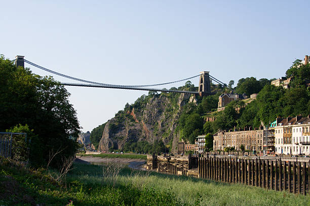 Clifton Suspension Bridge and the River Avon Suspension bridge in Bristol with the river Avon and houses in Hotwells clifton stock pictures, royalty-free photos & images