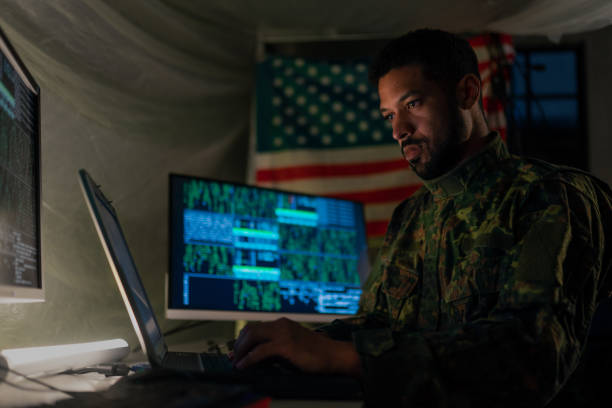 istock American hacker in military unifrorm on dark web, cyberwar concept. 1399895923