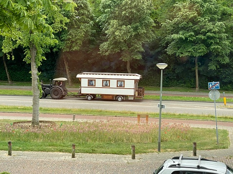 Brunssum, the Netherlands, - May 28, 2022. Parade of old Caravans on route in the city.