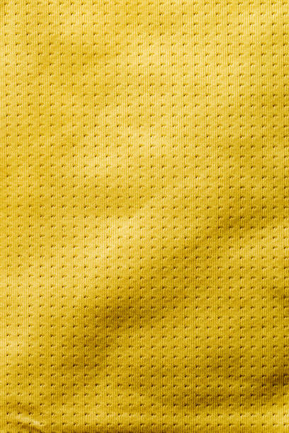 istock Yellow color fabric cloth polyester texture and textile background. 1399900925