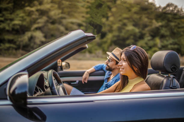 istock Romantic couple having fun on a road trip 1399903085