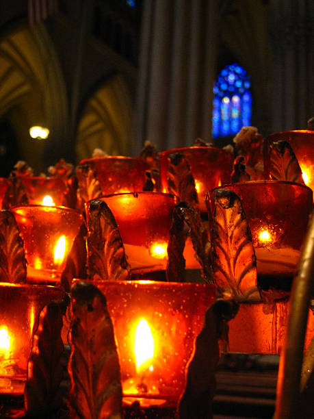 istock Prayer candles in church 139990427