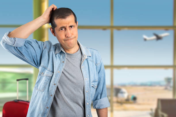 istock confused man at the airport 1399906935