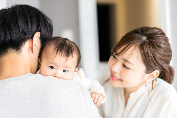 istock A baby happy to be held by his father 1399907089