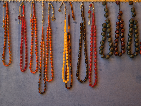 beautiful rosaries hanging on the wall