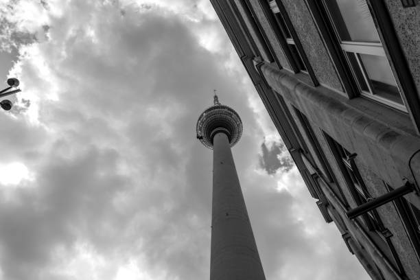 Germany, Berlin, Prenzlauer Berg, November 06, 2025 - Railway tracks and electric pylons against the Berlin skyline
