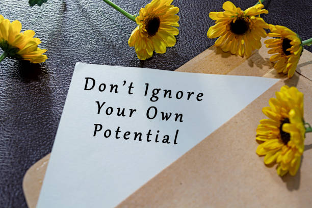 istock Inspirational quote - Don't ignore your own potential. 1399911691