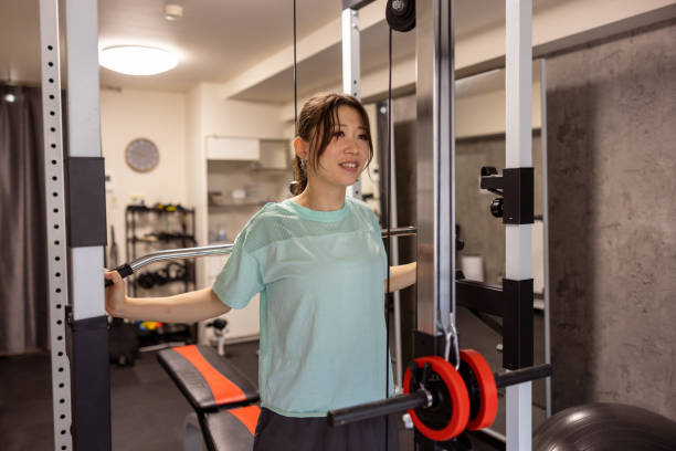istock Female athlete physical training in personal gym 1399913253