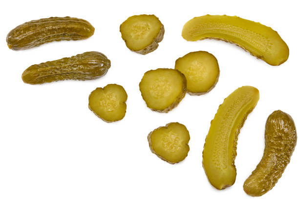 istock marinated pickled cucumbers with slices isolated on white background. Clipping path and full depth of field. Top view 1399914550