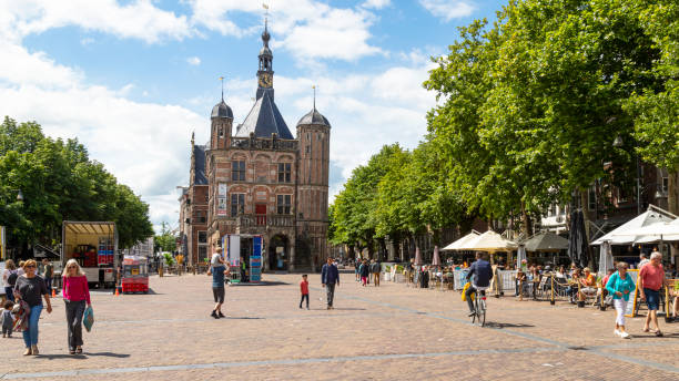 Central square with the 16th century Weighing House (Waaggebouw) on the Brink in Deventer. Deventer, The Netherlands, July 15, 2020; View of the central square with the 16th century Weighing House (Waaggebouw) on the Brink. deventer photos stock pictures, royalty-free photos & images