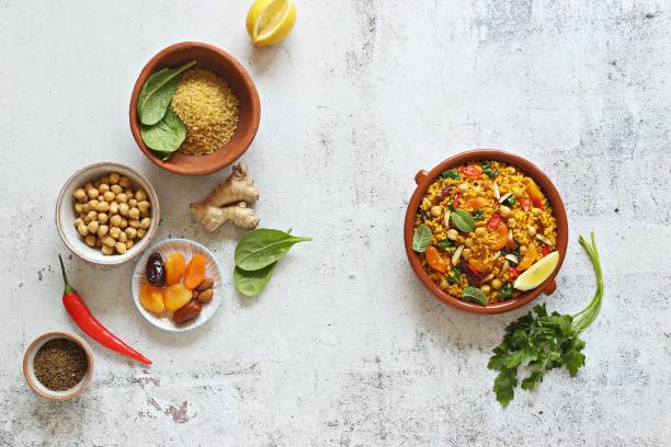 istock Vegan Moroccan Couscous with Chick Peas, spinach, dried apricots and date fruit. 1399917421