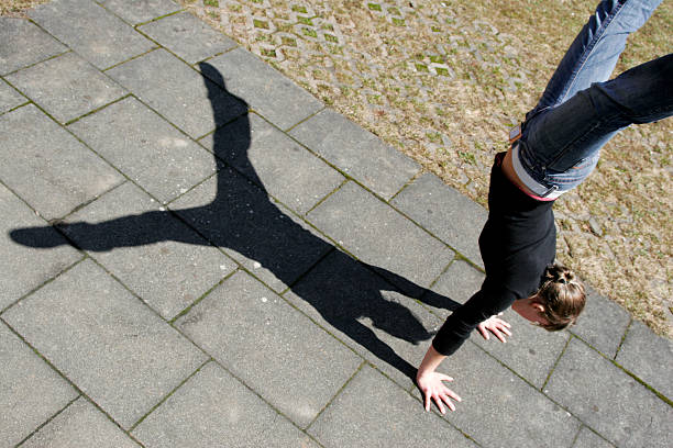 istock Girl doing handstand 139991813
