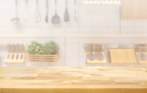 istock Selective focus.Wood table top on blur kitchen counter background. 1399918246