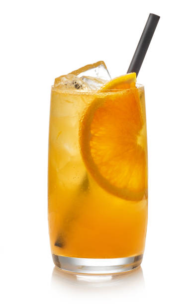 fresh summer cocktail glass of fresh summer cocktail with vodka and orange juice isolated on white background carbonated juice stock pictures, royalty-free photos & images