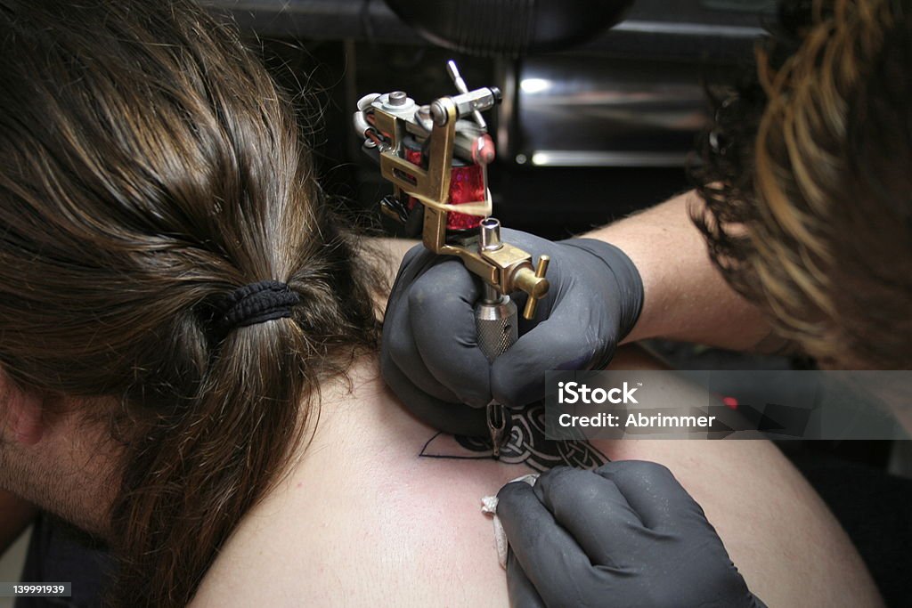 Наносить татуировку - Стоковые фото Machinery роялти-фри