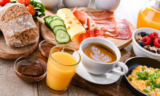 istock Breakfast served with coffee, scrambled eggs, cereals and ham 1399919957