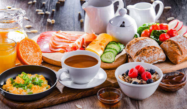 istock Breakfast served with coffee, scrambled eggs, cereals and ham 1399920005