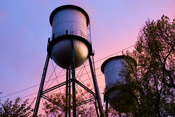 Watertowers at Sunset Watertowers at sunset after a big storm. chico california photos stock pictures, royalty-free photos & images