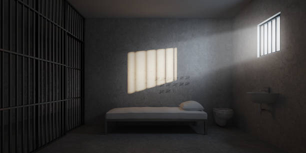 prison cell with rays of light from the window.3d rendering - prison stockfoto's en -beelden