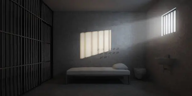 Prison cell with rays of light from the window.3d rendering