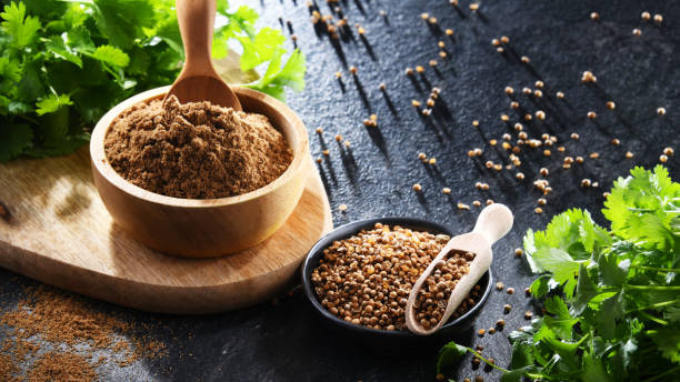istock Ground coriander, its dried seeds and fresh leaves 1399921547