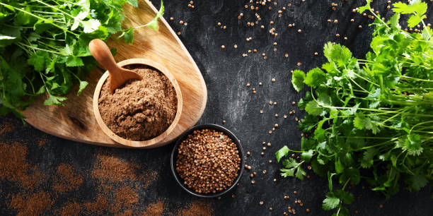 istock Ground coriander, its dried seeds and fresh leaves 1399921589