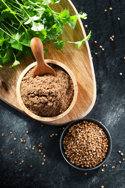 istock Ground coriander, its dried seeds and fresh leaves 1399921627