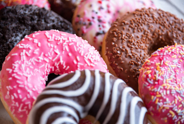 istock Bright pink donuts, sweet delicious baked dessert 1399922408