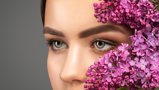 Beautiful eyes of a woman with make-up close-up.  makeup and healthy clean skin. Professional makeup concept