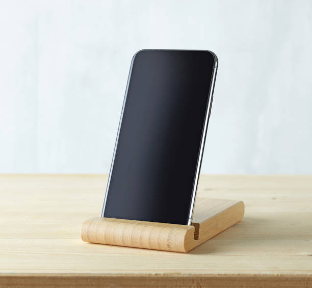 smartphone on light wooden table