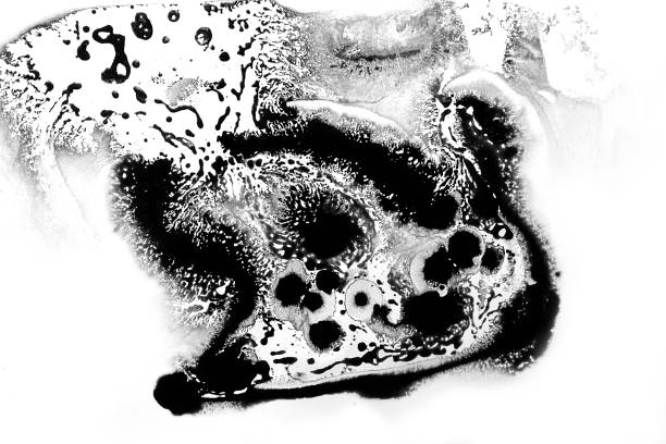 istock Abstract colorful black oil ink on paper close-up background texture 1399927580