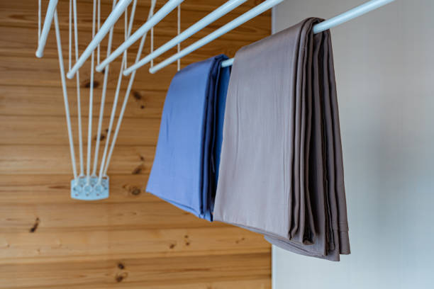istock clothes dryer attached to the ceiling with clothes hanging 1399928670