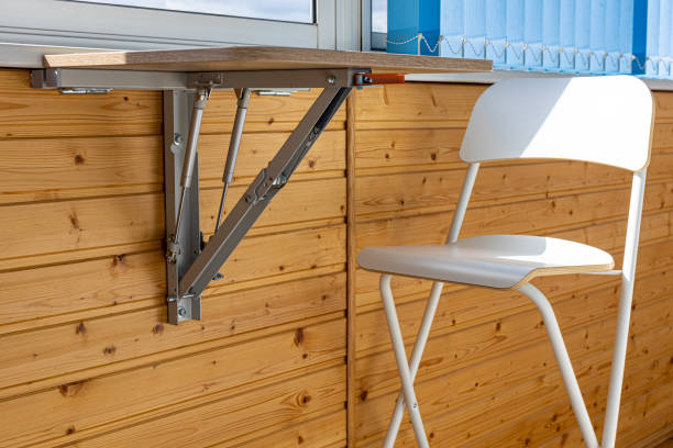 istock folding table in the unfolded position on the balcony 1399928751