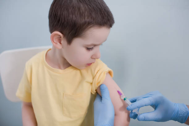 istock Vaccination concept with child in clinic 1399928838