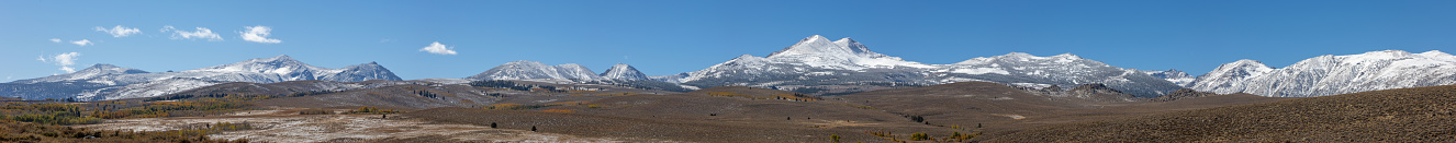 Panorama of autumn colors in front of the Sierra Nevada Mountains