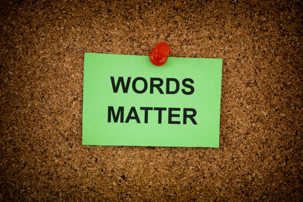istock A sticky note with the phrase Words Matter on it pinned to a cork board 1399931960