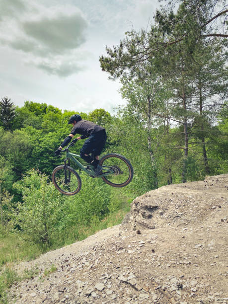 istock mountain bike jump 1399934131
