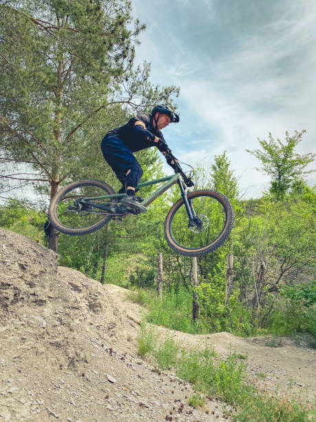 istock mountain bike jump 1399934149
