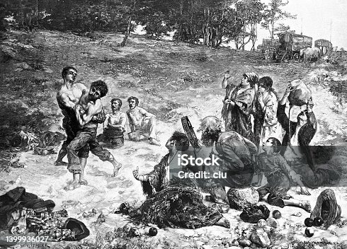 istock Wrestling among the gypsies on a meadow, friends and relatives cheer 1399936027