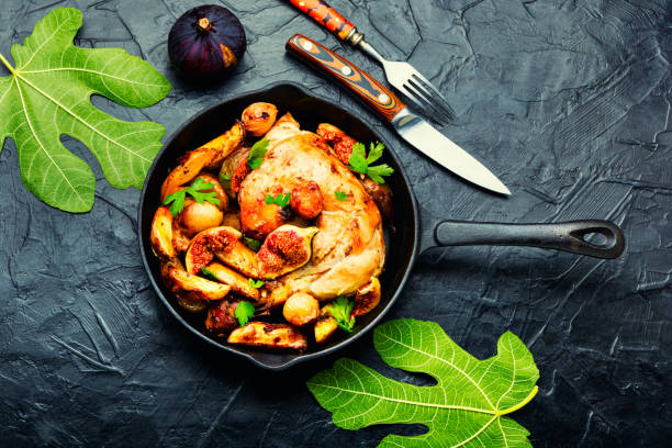 istock Chicken baked with potatoes and figs 1399937411